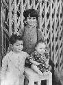 Portrait of three Marsh Arab children from the Khazal area