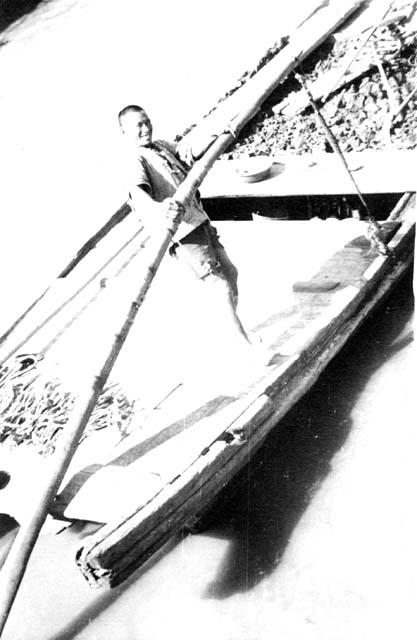 Man on boat; titled "Dredging operation" and "Soil for sale'"