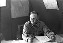 American soldier with Johnson name tag at military base desk