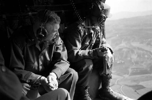 Two Military Men; Headphones; Landscape