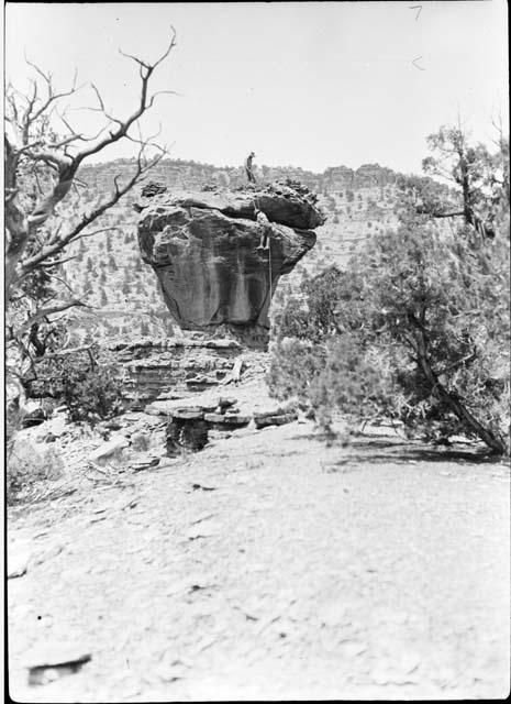 Scott descending pedestal rock