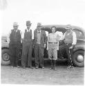 People in front of car, marked "Trip to #### Juan, Abelardo, espejo SRA Carrion,