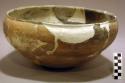 Ceramic bowl, flared lip, brown-on-buff interior, reconstructed