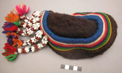 Woman's hat made of sheep's wool with shell & bead ornament