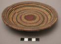 Colored coiled basketry plate