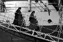 Two nuns descending ramp of a ship.