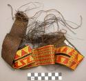 Wide basketry belt with slit at sides--brown with red and yellow design