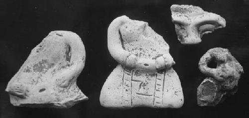 Figurine bodies (3) and face from effigy pot.