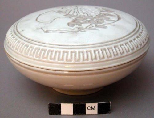 White ceramic covered bowl