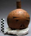 Decorated gourd lime receptacle