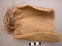 Man's basketry pouch for carrying personals