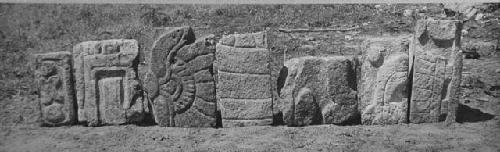 2D7. Sculptured stones from S side of base.