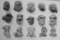 Heads from whistles & from miniature whistling pots (15)