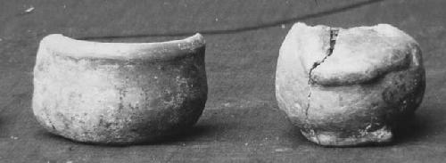 Left = Miniature effigy red-brown vessel - Dia. orif. 6.2, Ht. 4.2  Rt