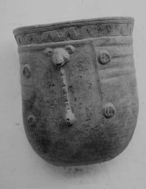 Fine goblet, black-brown coarse incised