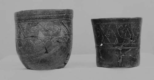 Black-brown fine incised goblet and cylinder (2)