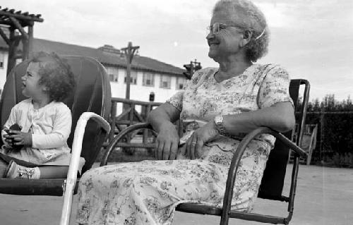 Woman and girl in chair