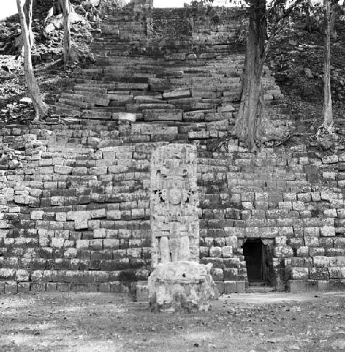 Stela and structure at Copan