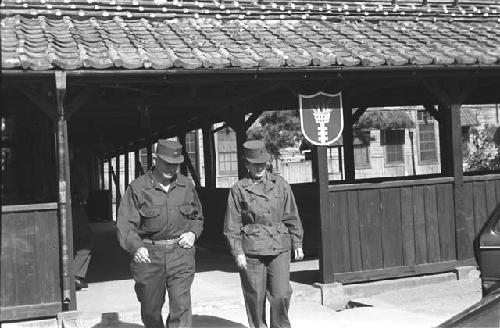 Two military Men; Covered Walkway