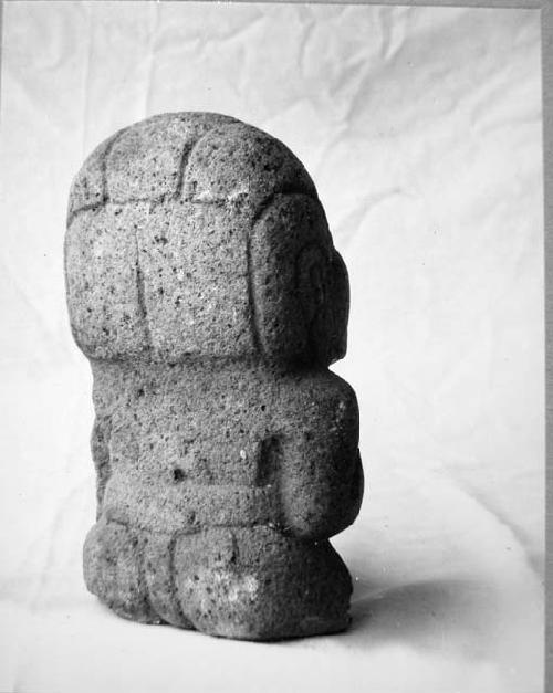 Stone sculpture, seated human fig.  Ht 19 cms