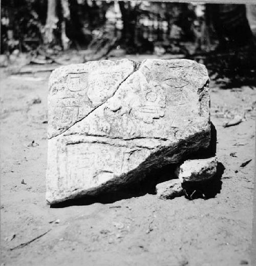 Limestone tablet broken in 2 parts, as found in situ on SE side of platform 53-2