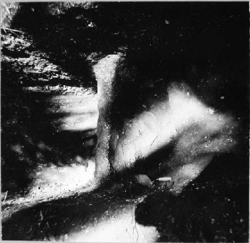 Exploration trench at foot of temple mound. Foreground: vessel 10