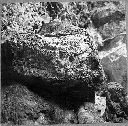 Rock carving on East wall of cenote, South end