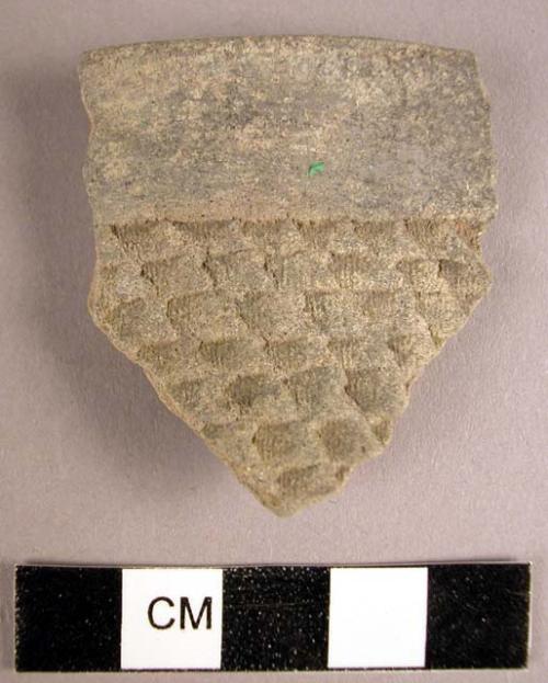 Corrugated grey ware potsherds (1 rim sherd - photograph)