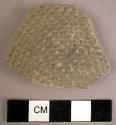 Fine corrugated potsherd