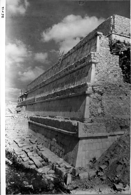 T. of Wars. Looking W. along S. side of pyramid after repair of sloping elements