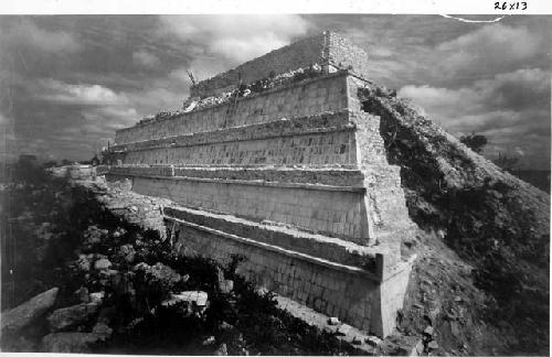 T. of Wars. Looking W. along S. side of pyramid after repair of sloping elements