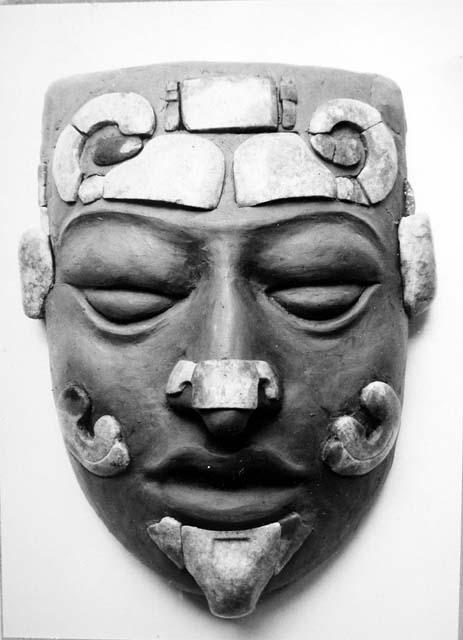 Trial reconstruction of jade mask (?).