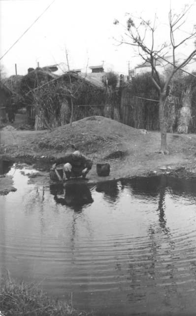 Man collecting water