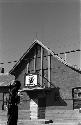 Soldier standing outside of building