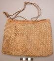 Man's basketry pouch for carrying personals