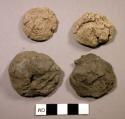 Clay blobs with flat, roughly circular base