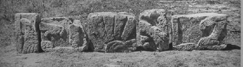 2D7. Sculptured stones from S side of base.