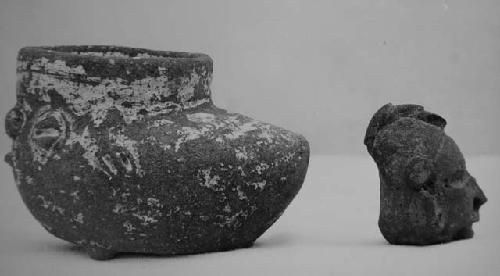 Small ruddy paste, white slipped, tripod effigy, shoe-shaped vessel; figurine he