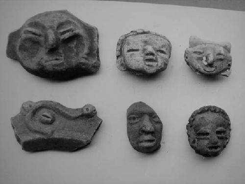 Figurine heads and frags. of effigy vessels (6)