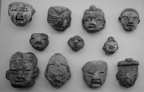 Figurine heads (11), all white paste, unslipped (?) except. #1,2. Variants.