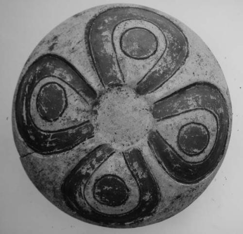 Red and cream bowl, bottom view; for side view see 39-1-42