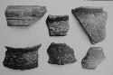 Brown-black fine incised sherds (6)