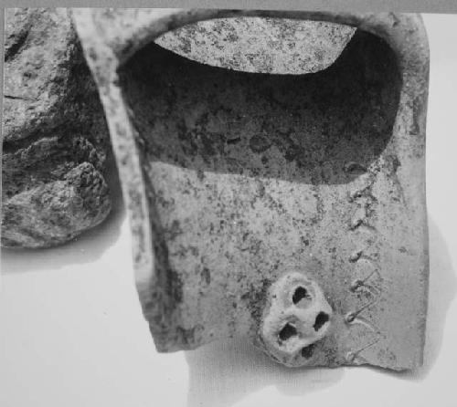 Neck of incised and punctate Miraflores jar-close up