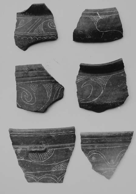 Black-brown fine incised sherds (6)