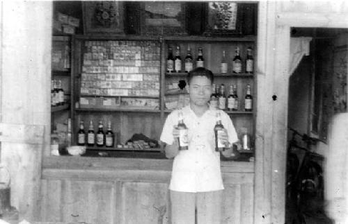 Man holding bottles