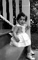 Young girl posed on steps