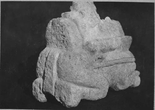 Limestone figure. Same as 54.15.7 (V.V.) back (or top) view