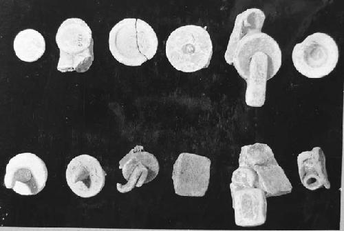 12 effigy censer types of ear plug some may be adornos used elesewhere