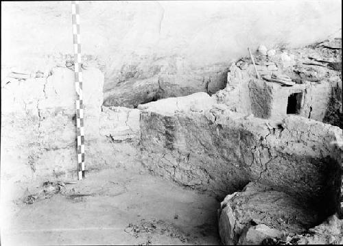 Cist, southeast corner; post northeast corner; plugged door to room 3