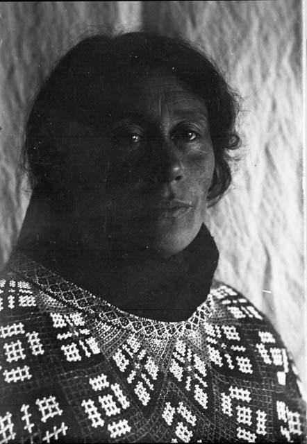 Portrait of Woman in Beaded Collar